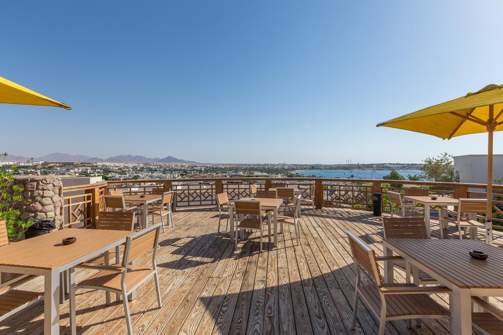 Naama Bay Hotel & Resort Sharm el Sheikh Esterno foto The rooftop bar at the hotel